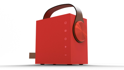 Red portable speaker with brown handle on a white background