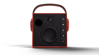 A portable Bluetooth speaker with a black front face, red side panels, and a matching red carrying handle on top, shown against a plain white background.